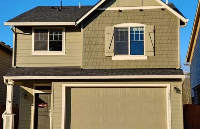 Beautiful Craftsman Style Home! 2 Car Garage! Gas Fireplace and Granite Counter Tops! Attached Garage, Private Yard, and Convenient Access to Shopping, Parks & I-5 photos photos