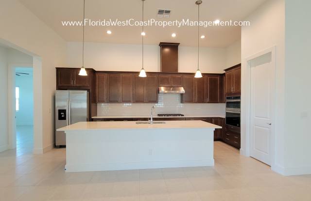 IMPRESSIVE TOLL BROTHERS HOME! SUPERIOR FINISHES with SUPERIOR AMENITIES! ISLES AT LAKEWOOD RANCH! Gallery 2