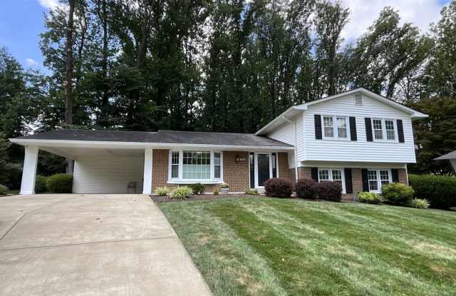 Handsome 5 Bedroom, 2.5 Bath , 4-level Brick Split Level Home Nestled Comfortably in Beautiful Pickett Estates photos photos