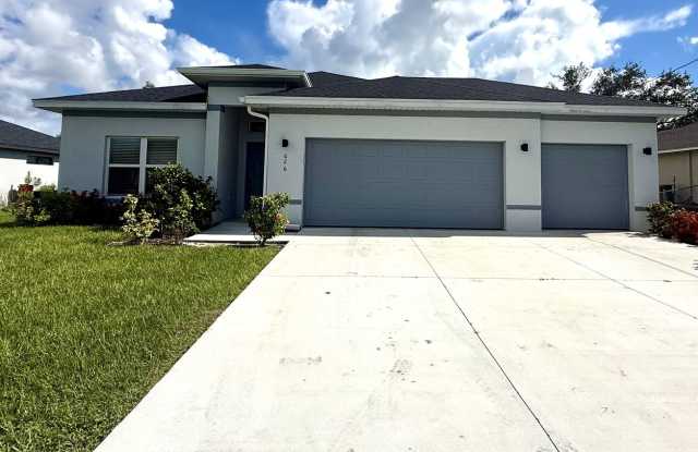 Modern Elegance Meets Everyday Comfort – 4-Bedroom Cape Coral Gem with 3-Car Garage! photos photos