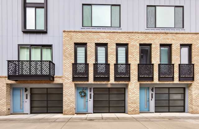 Ready to move into this beautifully maintained townhome with an attached garage in the heart of South End! Gallery 1