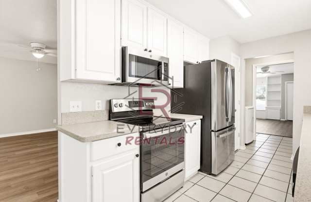 Welcome to this beautifully remodeled 3-bedroom photos photos
