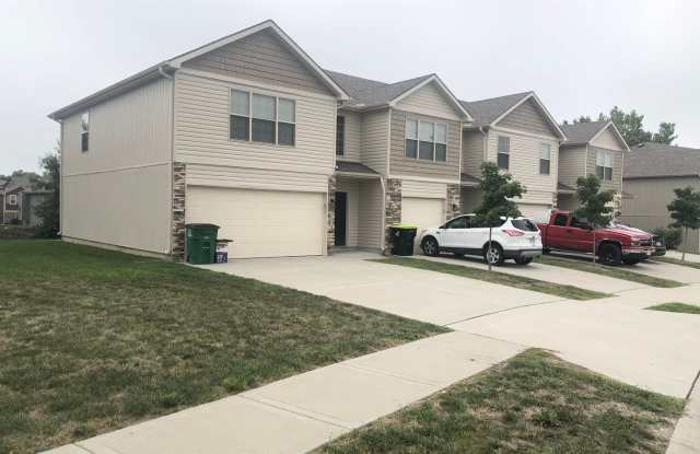 3 Bed | 2.5 Bath | 2 Car Garage Townhome in Grain Valley w/ Special photos photos