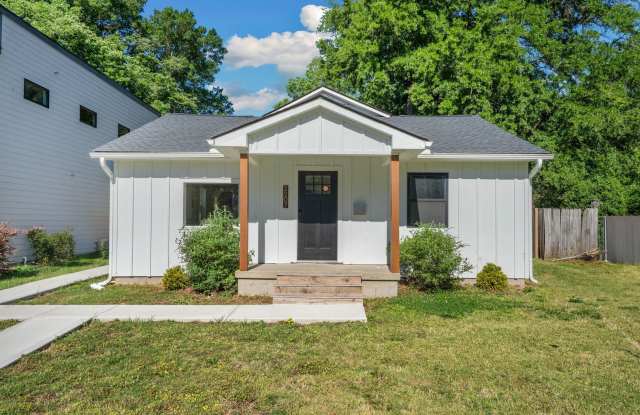 Beautifully renovated 3-bedroom bungalow near downtown with fully fenced yard! Gallery 1