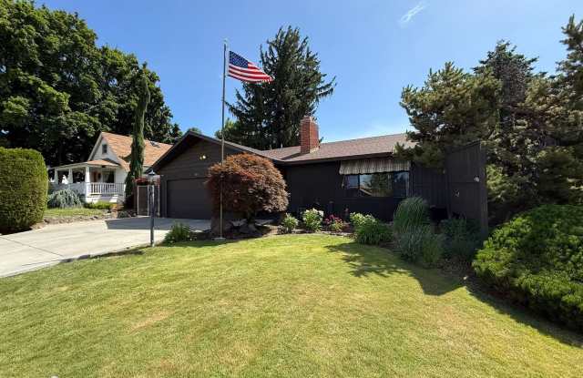 Spacious 4-Bedroom Yakima Home with Hot Tub  Attached Garage! photos photos