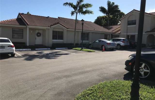 6551 NW 170th Ter - 6551 Northwest 170th Terrace, Country Club, FL 33015