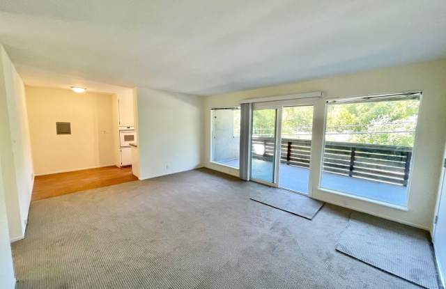 Sunlit 2BD/1BA w/ Private Balcony + Backyard! New Carpet! Assigned Parking! PROGRESSIVE photos photos Sunlit 2BD/1BA w/ Private Balcony + Backyard! New Carpet! Assigned Parking! PROGRESSIVE photos photos