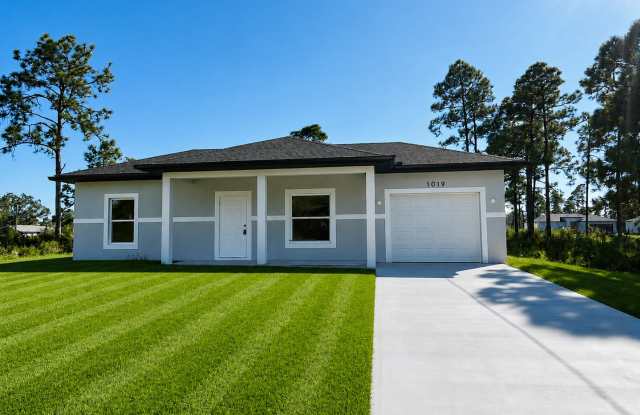 ONE OF A KIND! BRAND NEW 1 Bedroom-1 Bath- 1 Car Garage in Desirable Lehigh Acres! photos photos