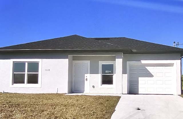ASK US ABOUT FREE RENT! MOVE IN READY SW LEHIGH ACRES, 2 BED 2 BATH SINGLE FAMILY HOME photos photos