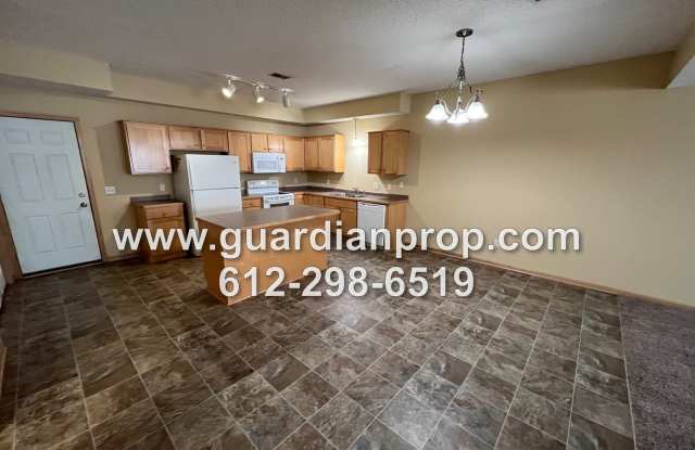 Huge End Unit Townhouse Available Mid April, Updated Flooring Throughout, Open Floor Plan, Loft Area, 2 Car Garage - 3662 Coon Rapids Boulevard Northwest, Coon Rapids, MN 55433