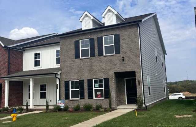 **BE THE LUCKY ONE TO LIVE IN THIS 2024-BUILT END-UNIT TOWNHOME IN A RESORT-STYLE COMMUNITY** photos photos