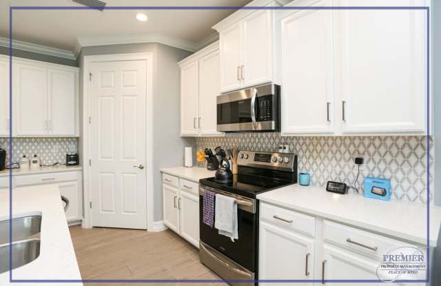***STUNNING 4 BEDROOM HEATED POOL HOME IN BONITA SPRINGS WITH AMAZING AMENITIES **** photos photos