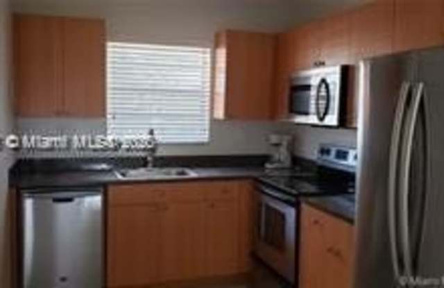 4751 NW 9th Dr photos photos