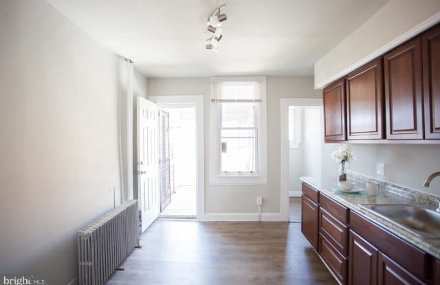 921 N BENTALOU STREET - 921 North Bentalou Street, Baltimore, MD 21216