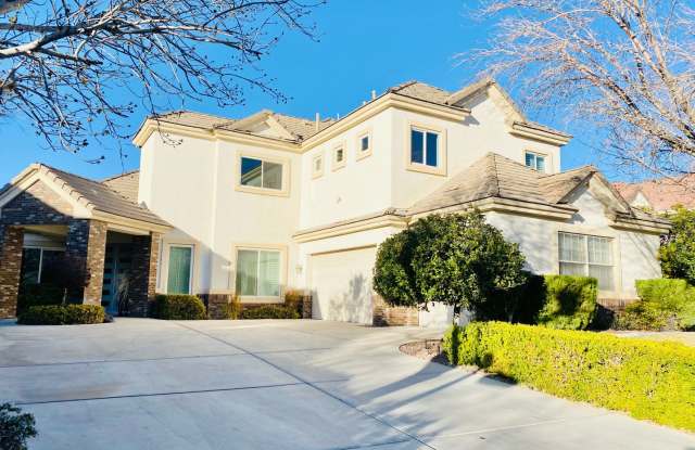 Beautiful 2 Story home in Queensridge guard gated community with spacious 5 bedrooms & 4 bathrooms. Luxury features and High Ceilings, 3 car garage, Private Backyard and great natural lighting. Guard gated, zoned for Pal Verde High School. photos photos
