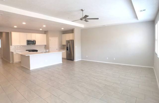 Los Lunas 3 bedroom! Tile Throughout! Refrigerated Air! Spacious living area photos photos