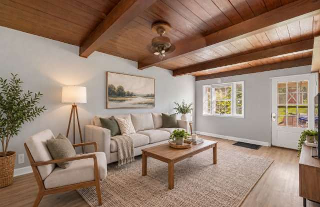 Home-Like Living with Sunroom, Attached Garage & In-Unit Laundry Gallery 1