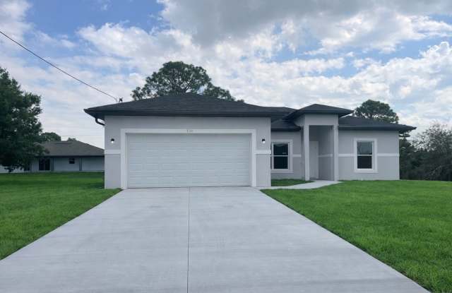 New 4 Bed / 2 Bath / 2 Car Garage Family Retreat in Desirable Lehigh Acres! photos photos