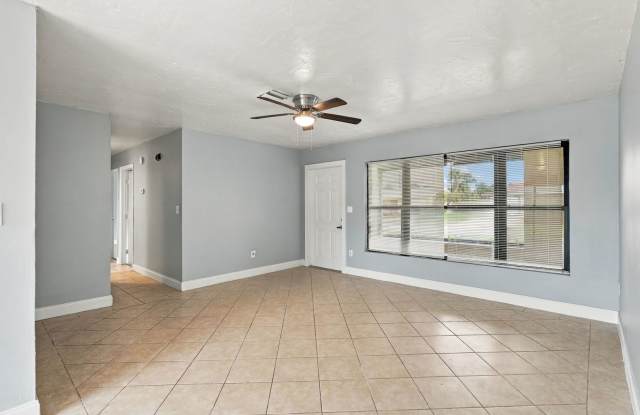 Freshly Painted 3-Bedroom, 2-Bathroom Home with Spacious Kitchen, Fenced Yard & Carport Gallery 4