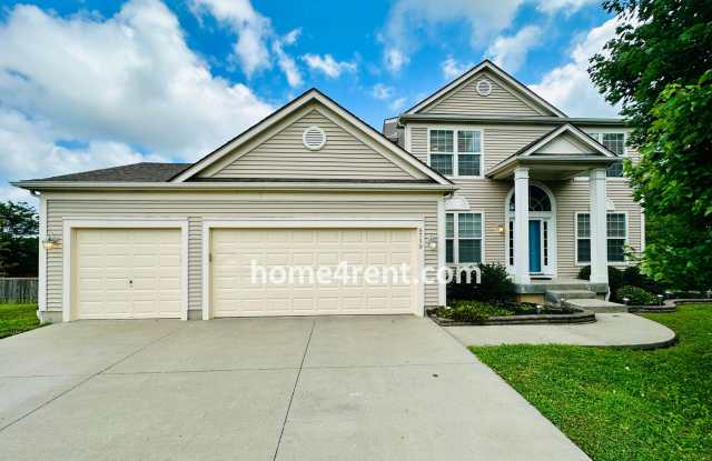 Wood Floors, Open Layout, Plenty of Natural Light, and Fenced Yard! - 8719 Dunraven Street, Lenexa, KS 66227