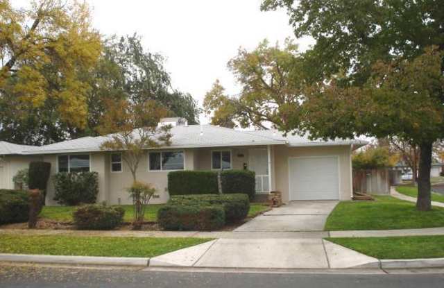 Updated 3 bedroom 2 bathroom home with large backyard, corner lot, close to shopping and schools + plenty of nice amenities. photos photos