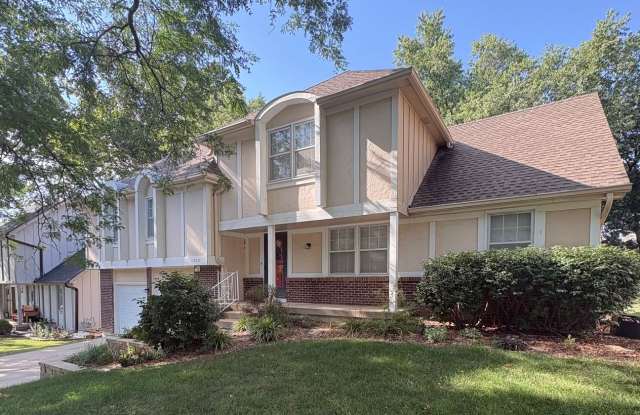 2 Separate Living Spaces in One Home! 5 Bedroom/3 Bath Overland Park Home with Finished Lower Living Suite & Partially Fenced Backyard photos photos