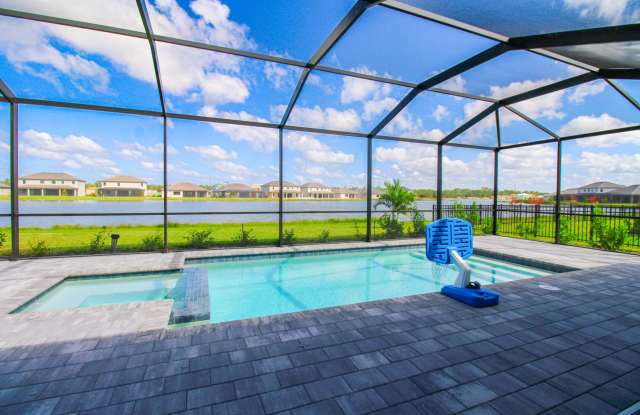 ** STUNNING 3 PLUS A DEN\3 BATH NEW 2024 CONSTRUCTION PRIVATE POOL AND SPA HOME READY FOR A SEASONAL TENANT ** TIMBER CREEK ESTATES ** - 10785 Timber Creek Drive, Gateway, FL 33913