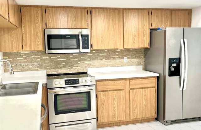 1005 Palm Beach Trace Dr photos photos