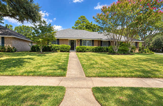 Spacious four-bedroom home located in University Terrace neighborhood with full fenced-in backyard. photos photos
