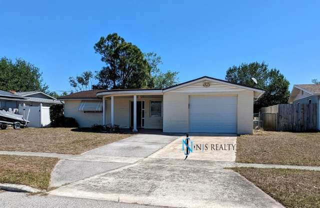 Gorgeous 2/1/1 1100 Sq. Ft. with HUGE kitchen/great room combo, tile floors throughout, BONUS ROOM a fenced in yard!!!! Gallery 2