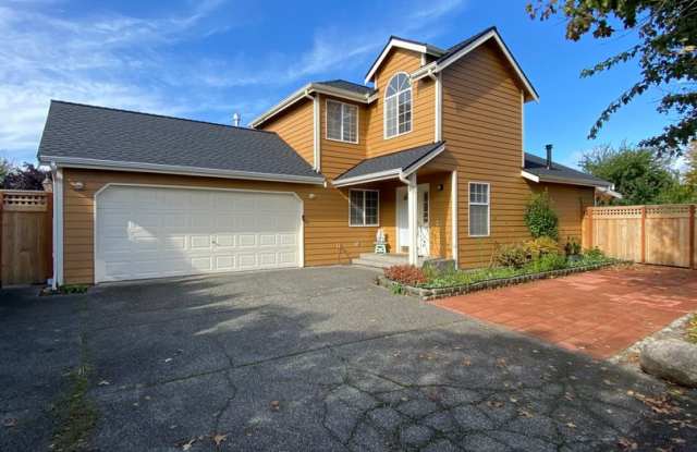 Private, light, bright and spacious 3 bedroom + den home with large master suite and a 2 car garage plus additional parking. photos photos