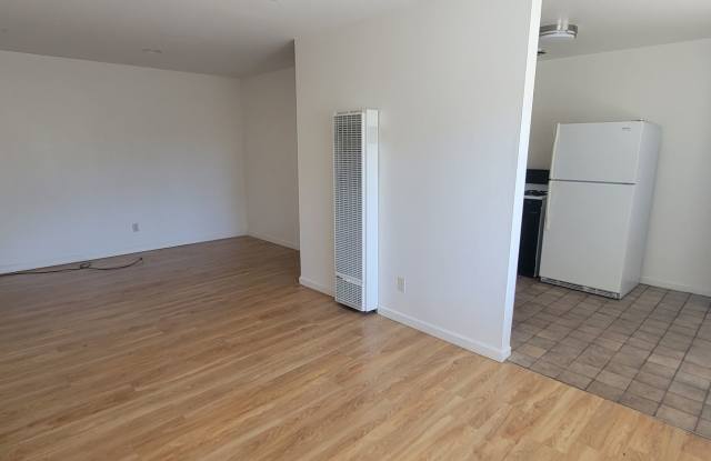 Clean, quiet 2 bedroom, and end unit, with lots of Natural Light in the Living Room and Kitchen area photos photos