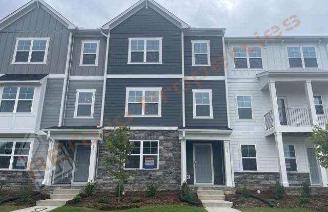 BRAND NEW- Spacious 4 Bedroom, 3 Bathroom Home w/ 2-Car Garage in Stoneriver - Knightdale. Washer and Dryer included! Available now! photos photos