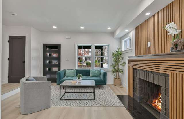 Tudor Duplex w/ 3 Parking Spaces + EV Charging and Garage Gallery 4