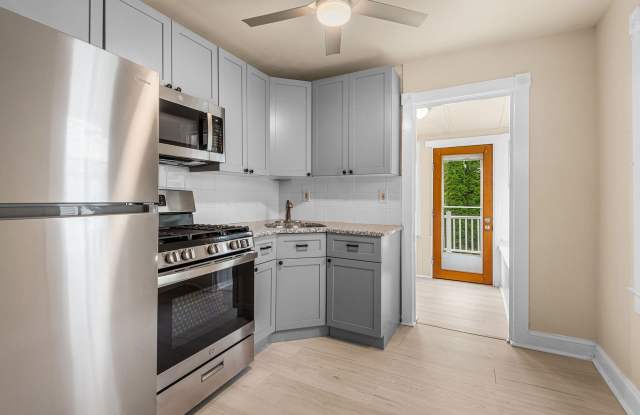 FIRST MONTH RENT FREE** Renovated Row Home (new kitchen/floors & paint) located in Rose Tree Media SD! Deck, Private yard, Central Air! Gallery 4