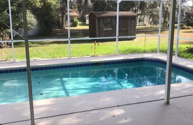 Beautiful 4 Bedroom Pool Home in the Heart of Spring Hill Gallery 3