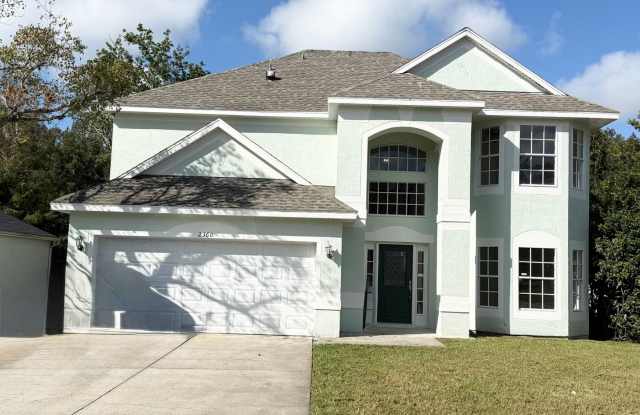 Beautifully Updated 4-Bedroom Home with Pond View in Prime Location! - 2360 Coolbrook Court, Oviedo, FL 32766