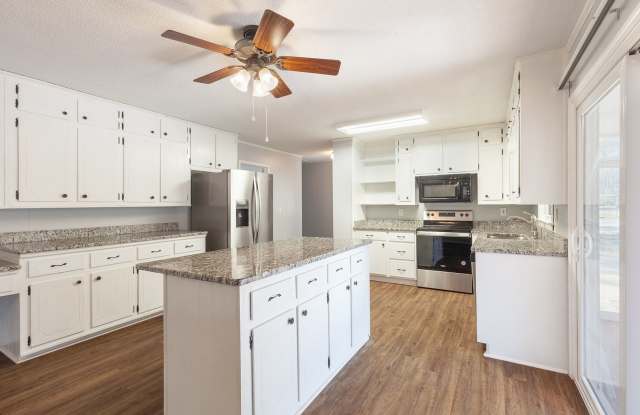 Spacious 4bd/2.5ba Ranch w/ Two-Car Garage  Large Basement and Screened Porch! photos photos