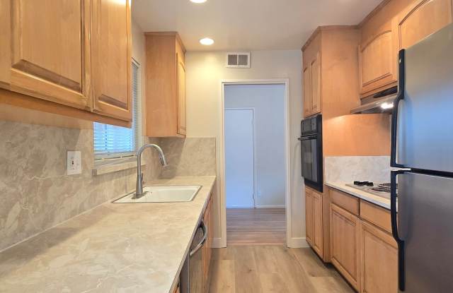 Spacious Split Level Home, Wood Floors, Fresh Paint, Nice Backyard, Great Location! Gallery 3