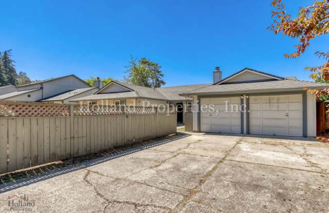 Charming Single-Level Duplex with Fireplace, Fenced Yard & Detached Garage photos photos