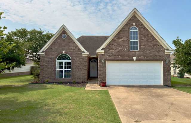 4 Bed, 2 Bath Jonesboro Home with Bonus Room, Fenced Backyard, 2-Car Garage Gallery 1