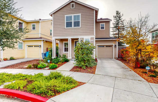 3 bedroom 2.5 bath corner unit - home with 2 car tandem garage, includes EV charger! Located in Village Walk HOA - 37 Lipton Way, Cotati, CA 94931