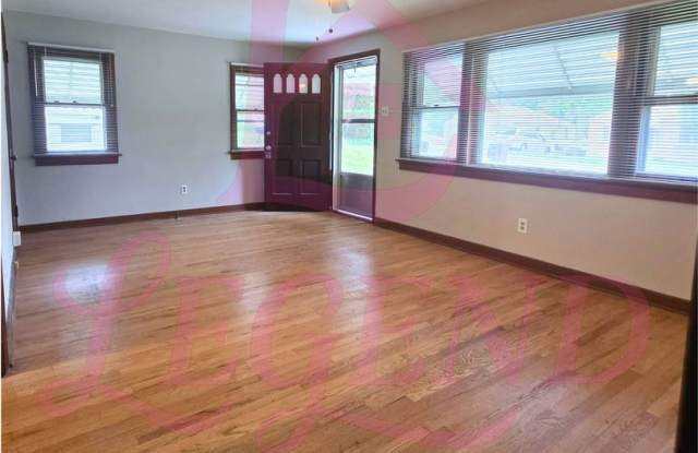 Updated 2-Bedroom Home with Bonus Room & Tuck-Under Garage Gallery 4