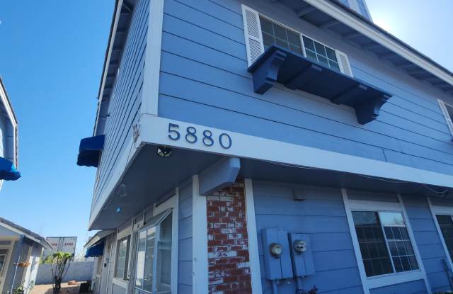 This 2nd floor unit features two bedrooms, and a spacious family room with a decorative fire place. - 5880 Medallion Drive, Whitney, NV 89122
