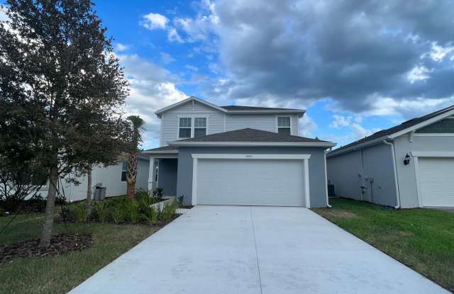 BRAND NEW 2 Story, 4-bedroom, 3-bathroom home with bonus loft located in the community of Canopy Terrace. - 2055 Canopy Terrace Boulevard, DeLand, FL 32724