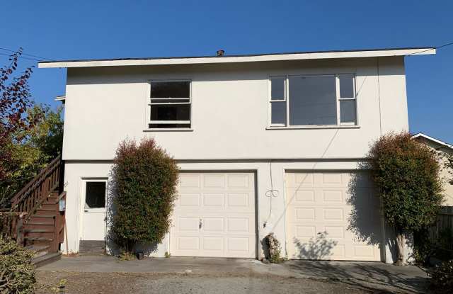 Great 2 bedroom upstairs standalone unit with garage photos photos