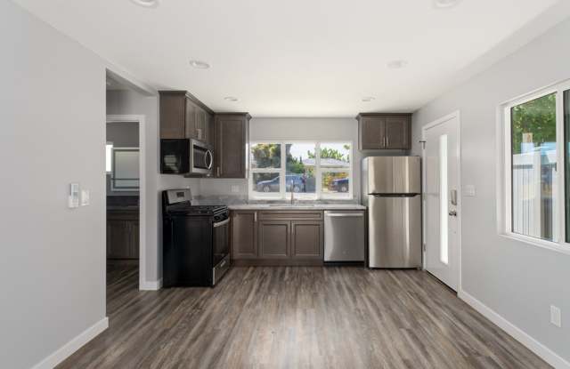 Luxurious 1-Bedroom Apartment with Private Yard in the Heart of Carlsbad / ALL UTILITIES INCLUDED + WIFI - Contact us for our move in special! photos photos