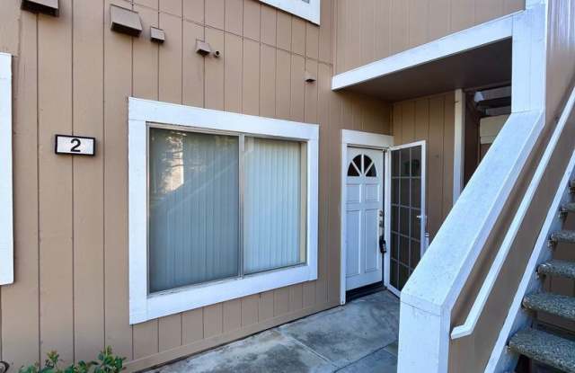 Located in Irvine, this remodeled 2-bedroom, 2-bath first-level condo combines modern updates with practical conveniences Gallery 1