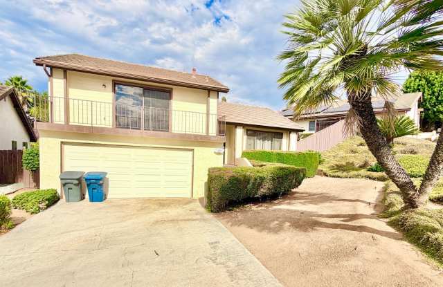 Wonderful Split-level Home with Spacious Backyard and Patio area located within the Gated and Lovely Cimmaron Community of Escondido! photos photos