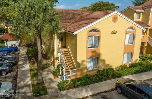 1056 CORAL CLUB DR - 1056 Coral Club Dr, Coral Springs, FL 33071